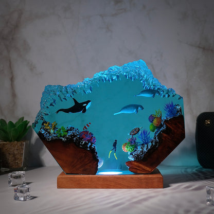 Killer whales swim with seals and humans Resin lamp