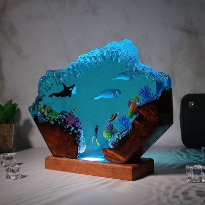 Killer whales swim with seals and humans Resin lamp