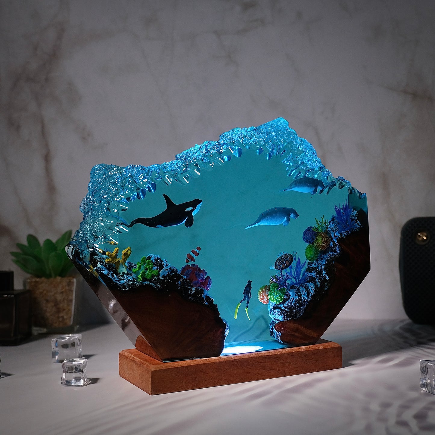 Killer whales swim with seals and humans Resin lamp