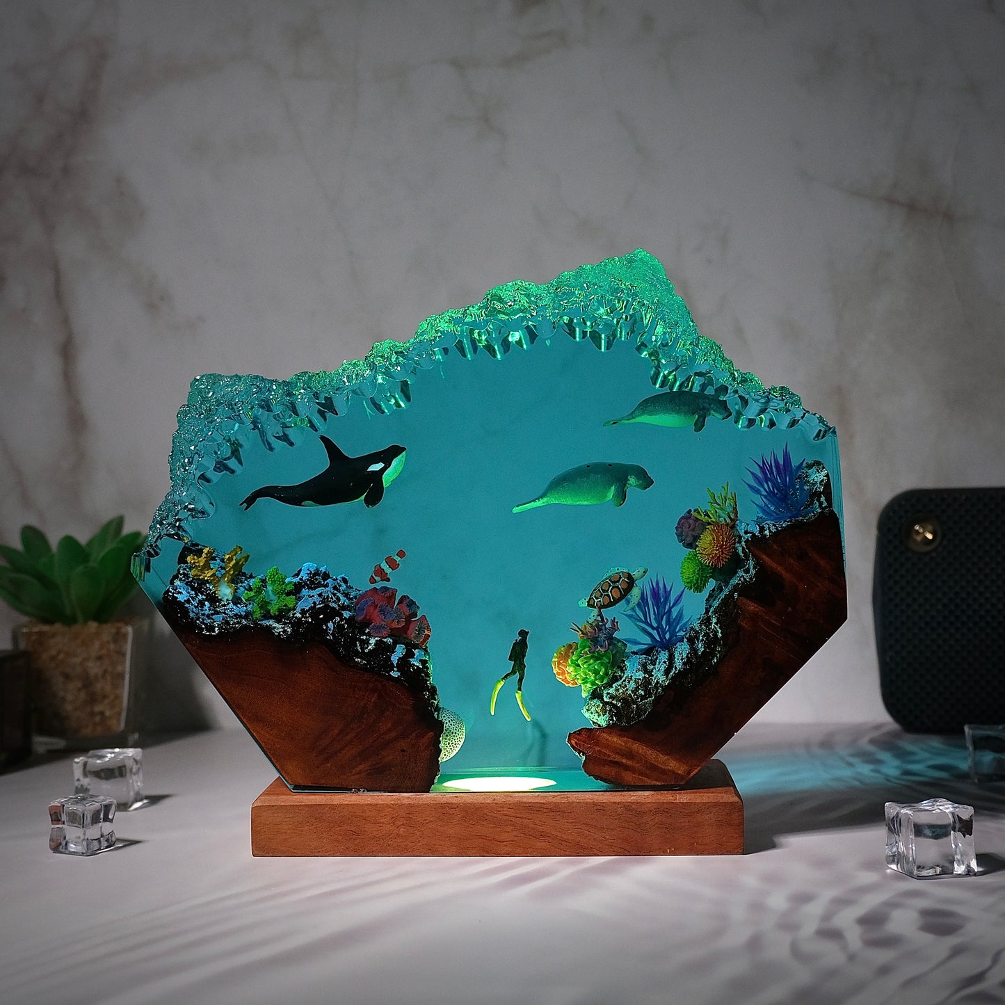 Killer whales swim with seals and humans Resin lamp