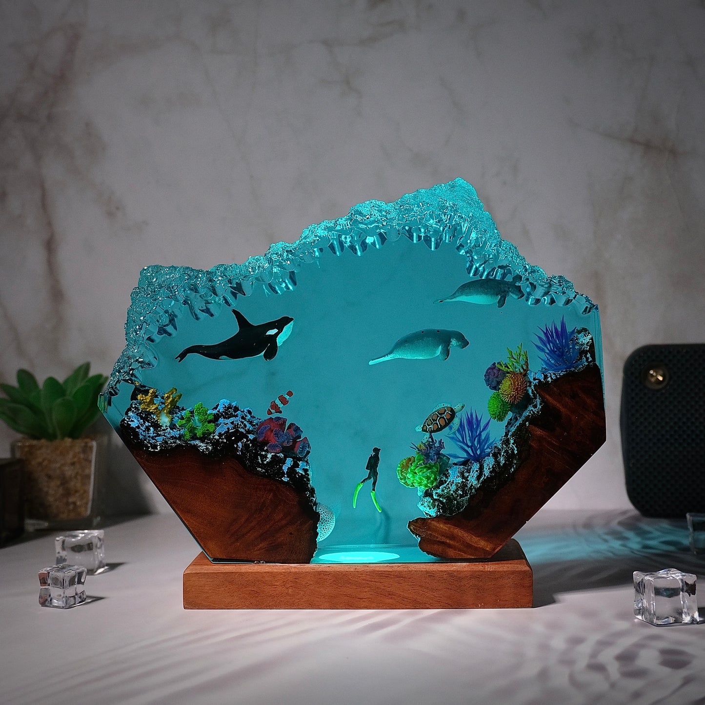 Killer whales swim with seals and humans Resin lamp