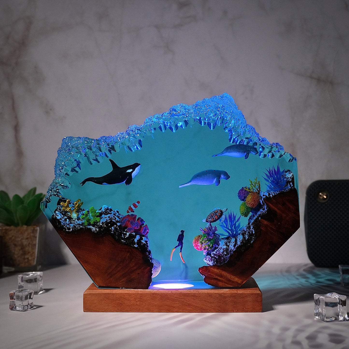 Killer whales swim with seals and humans Resin lamp