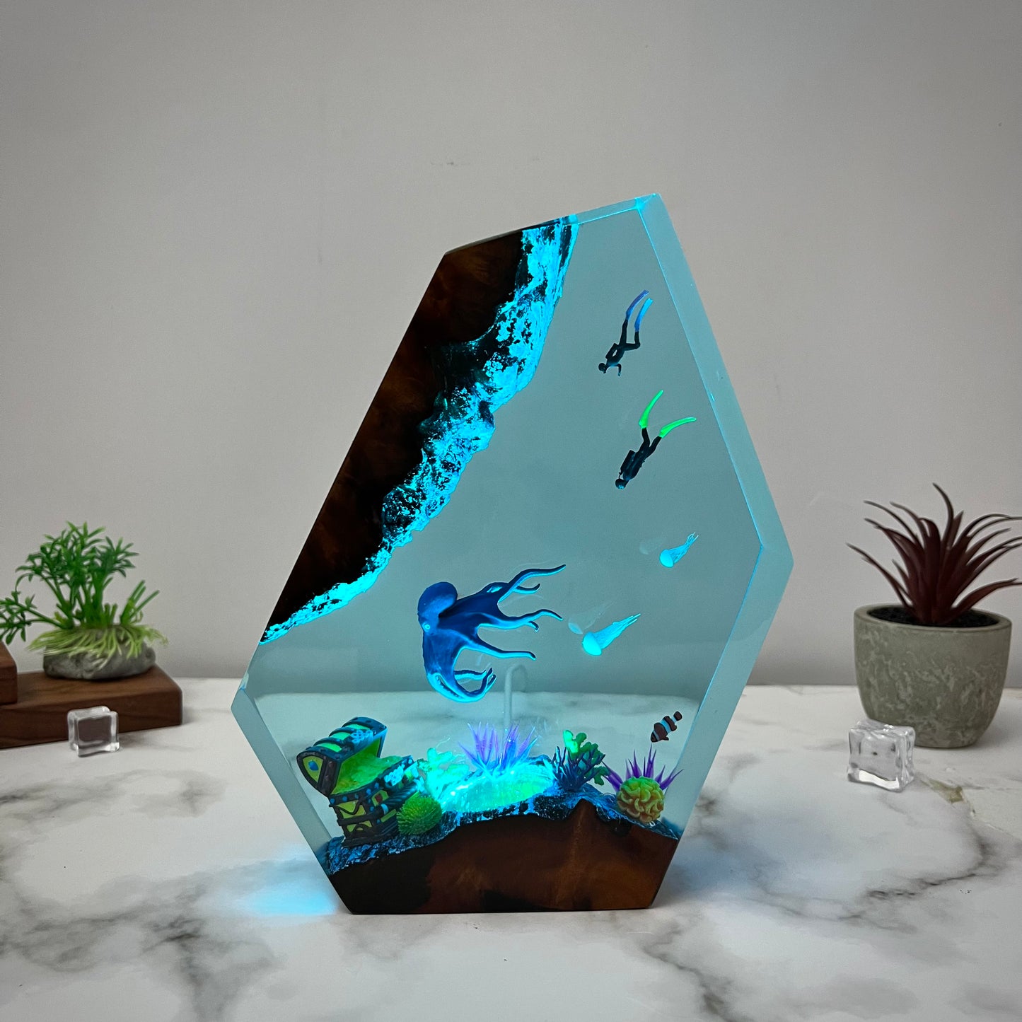 Ocean resin lamp.  Octopus and humans head towards the treasure