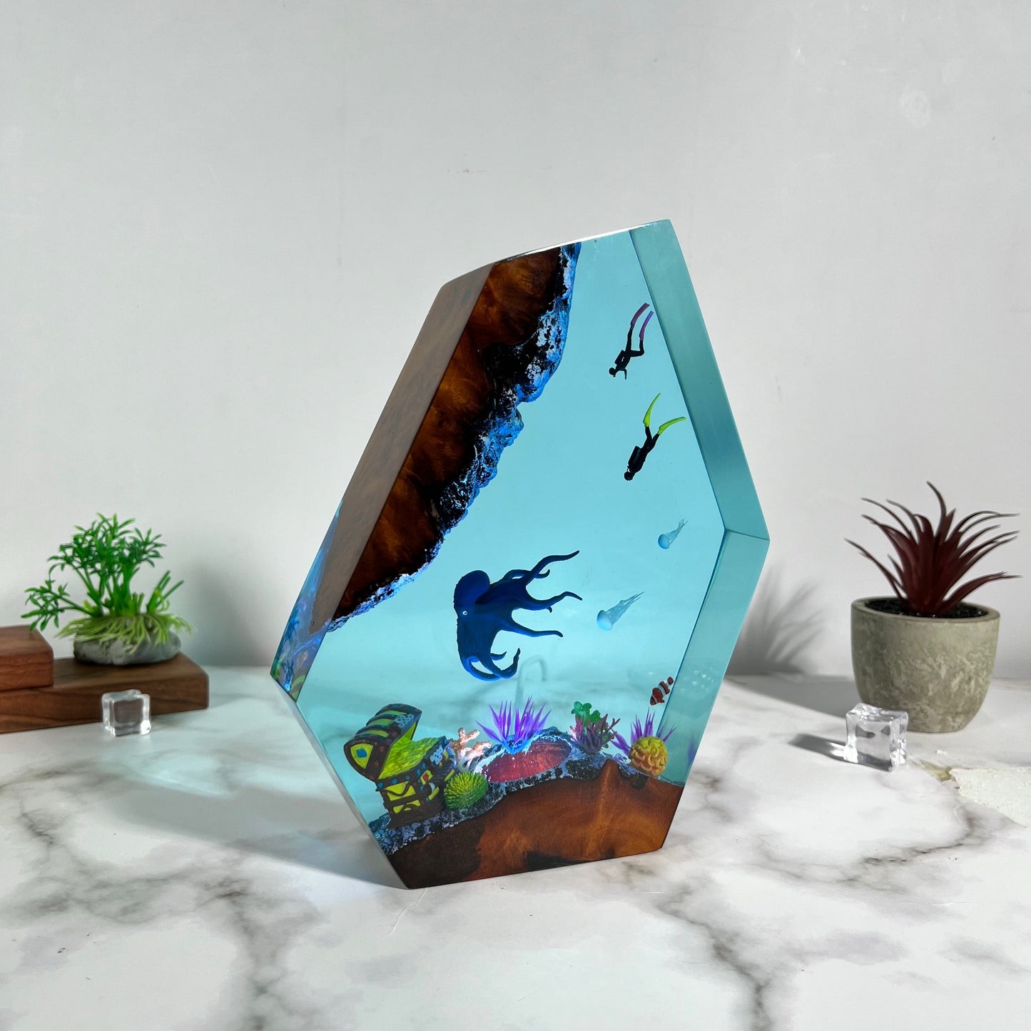 Ocean resin lamp.  Octopus and humans head towards the treasure