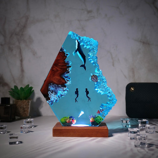 Blue whales and divers resin lamp