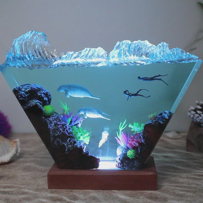 Ocean resin lamp.  Sea leopards and human in the sea