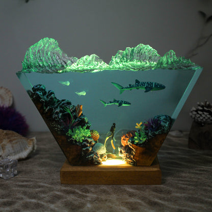 Ocean resin lamp. Sharks and humans in the sea