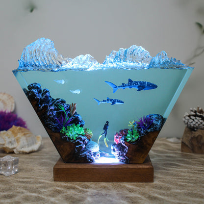 Ocean resin lamp. Sharks and humans in the sea