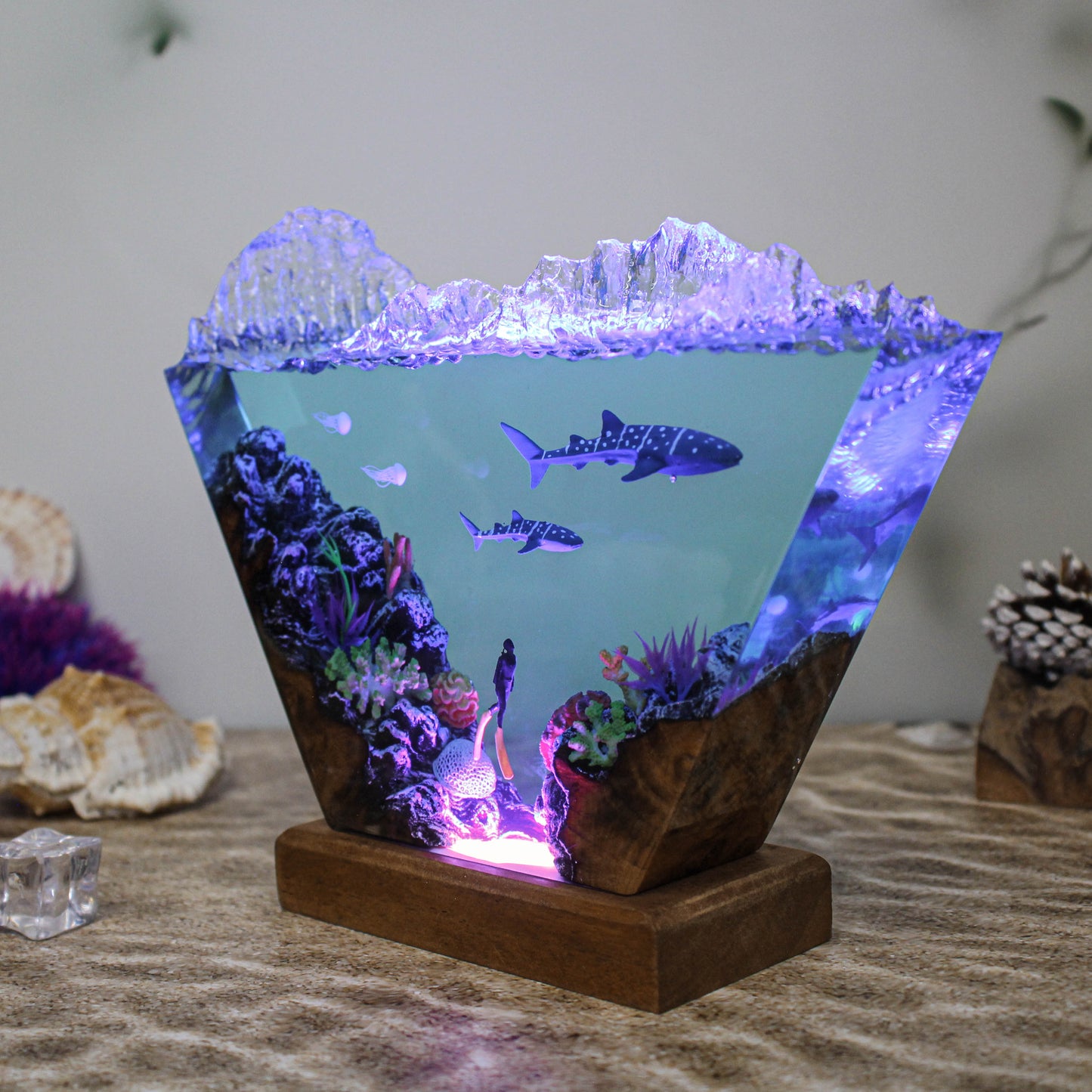 Ocean resin lamp. Sharks and humans in the sea