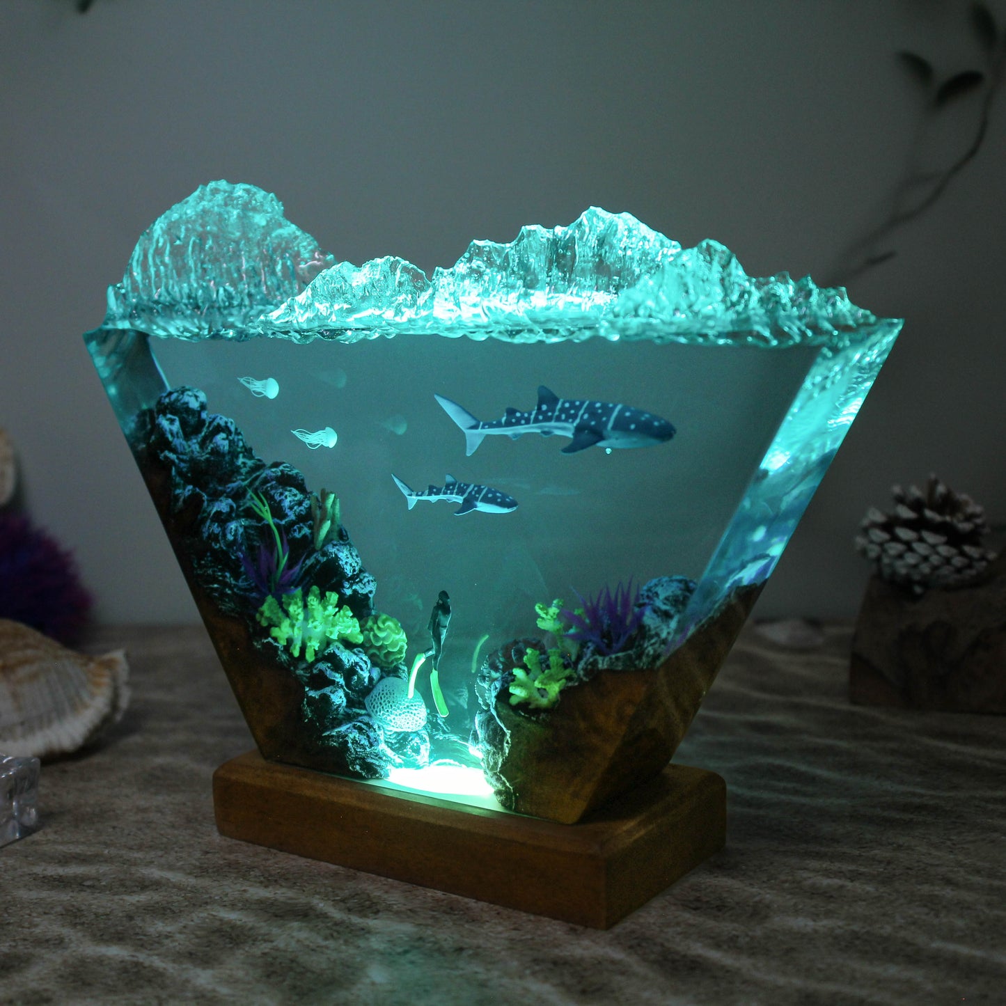 Ocean resin lamp. Sharks and humans in the sea