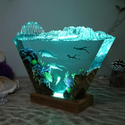 Ocean resin lamp.  Sea leopards and human in the sea