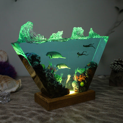 Ocean resin lamp.  Sea leopards and human in the sea